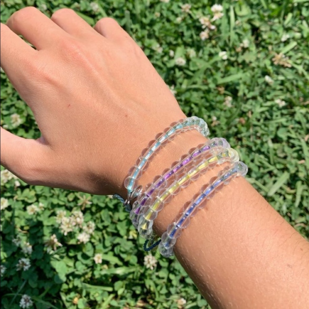 two 4ocean bracelets in colors teal and blue